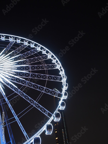 BANGKOK - February 5: Night scene of the Large Ferris wheel in Asiatique, open outdoor community shopping mall in Bangkok, Thailand, under dark night sky, on February 5, 2023.