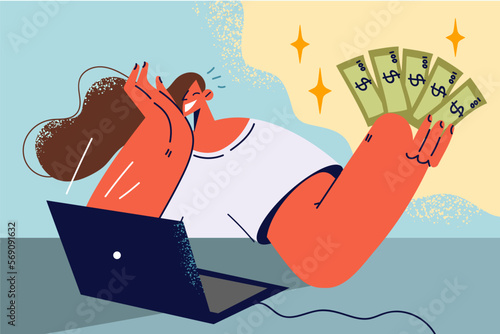 Smiling woman with money in hands work on laptop 