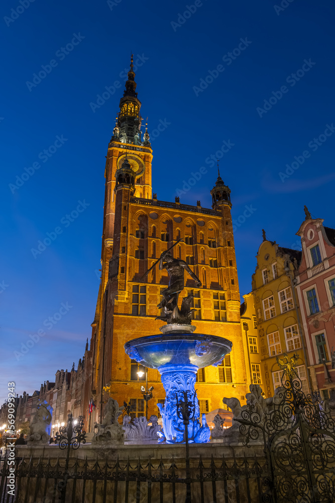 Neptune Fountain And Town Hall At Night In Gdansk, Poland