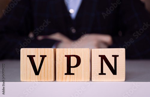 The word "VPN" written on wood cube. Technology concept, Security and anonymity on the internet © Uuganbayar