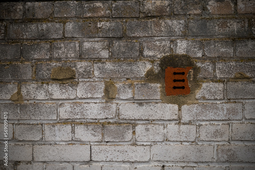 an old porous brick wall