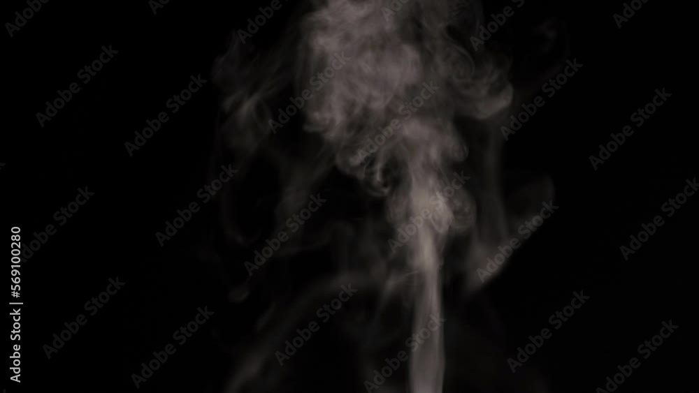 A jet of water vapor on a black background A jet of water vapor on a black background