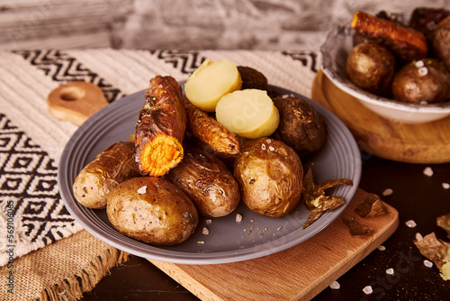 Healthy grilled peeled vegetables - potatoes, carrots, beets. Whole food diet, DASH, Mediterranean diet on natural rustic background. Ukrainian food