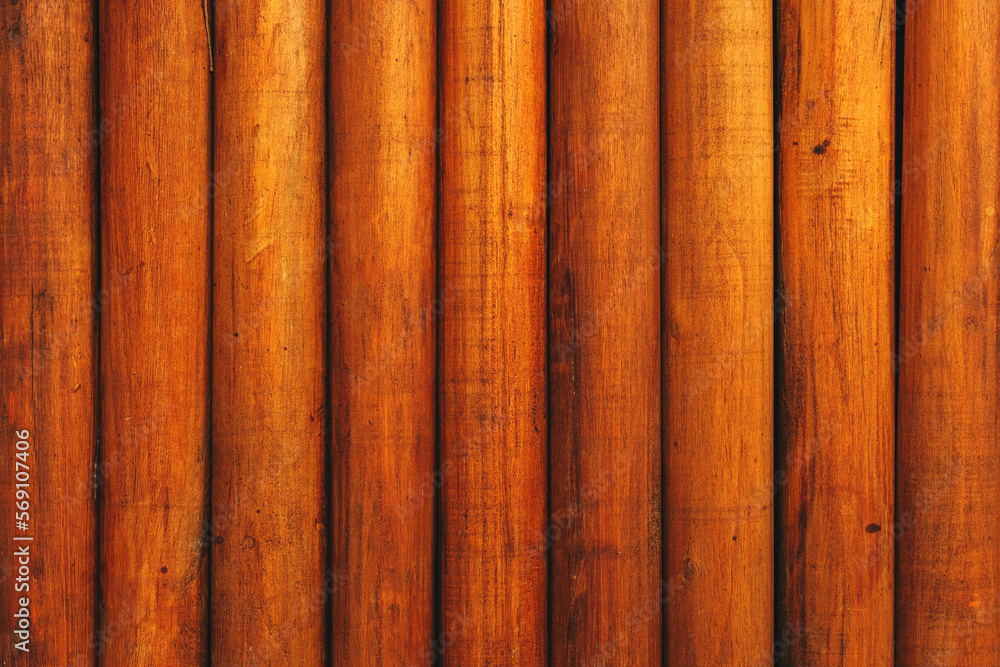 Round timber post wooden fencing as background Round timber post wooden fencing as background