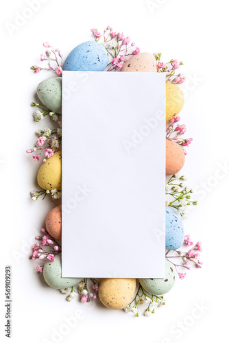 Photography Easter composition of Easter quail eggs, flowers, paper blank over white background