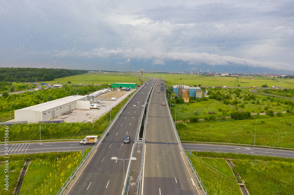 Aerial view of A3 Highway motorway road cross with city ring road (Centura Bucuresti DNBC in Romanian language) from Bucharest, Romania Aerial view of A3 Highway motorway road cross with city ring road (Centura Bucuresti DNBC in Romanian language) from Bucharest, Romania