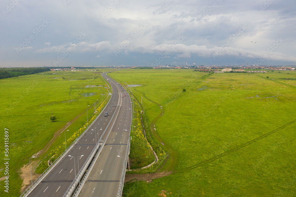 Aerial view of A3 Highway motorway road cross with city ring road (Centura Bucuresti DNBC in Romanian language) from Bucharest, Romania
