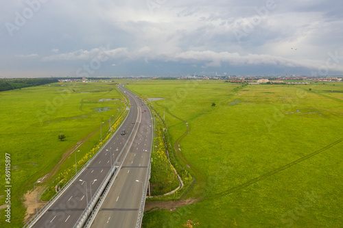 Aerial view of A3 Highway motorway road cross with city ring road (Centura Bucuresti DNBC in Romanian language) from Bucharest, Romania