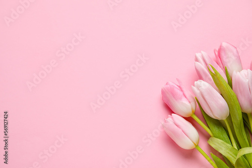 Bouquet of beautiful tulip flowers on pink background © Pixel-Shot