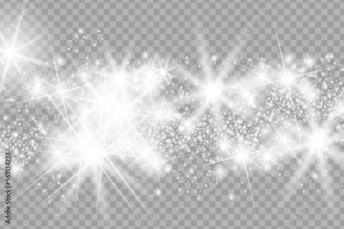 The dust sparks and golden stars shine with special light. Vector sparkles on a transparent background.