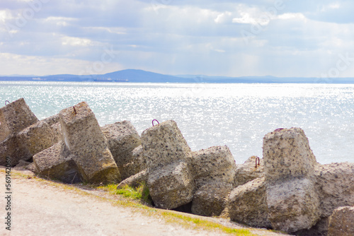 large shaped stones on pier by the sea. nature, landscape, background