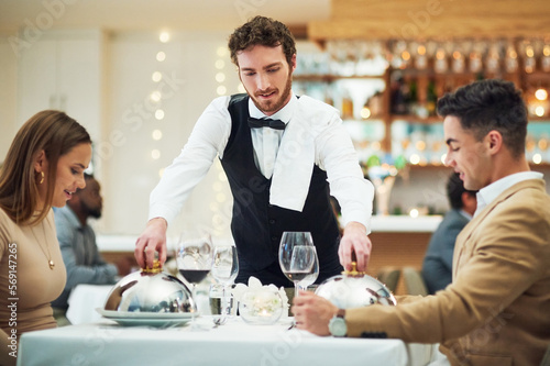 Fotografi Couple, restaurant server and fine dining with food for valentines day date, love and romance in night