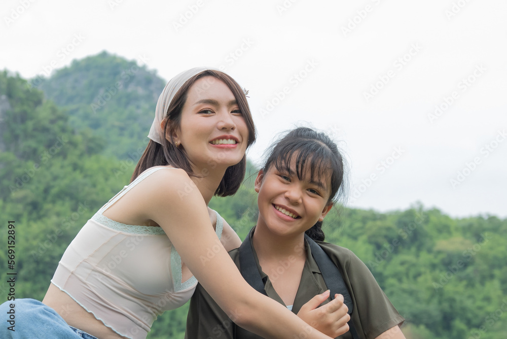 people and friendship concept - happy smiling teenage girls, Portrait of beautiful woman smiling and looking away at park during sunset. Happy cheerful girl laughing at park. people and friendship concept - happy smiling teenage girls, Portrait of beautiful woman smiling and looking away at park during sunset. Happy cheerful girl laughing at park.