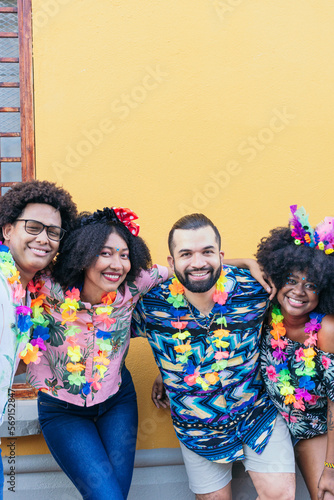 A group of friends having fun at a street party in Brazil.