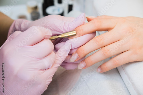 Closeup Of Beautiful Female Hands Having Manicure At Beauty Salon.