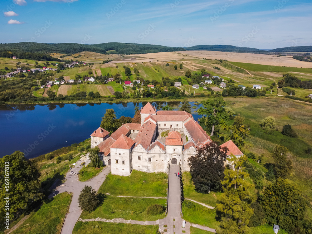 Fototapeta premium Aerial view by drone. Summer. Svirzh Castle Ukraine Castles. Lakes. 