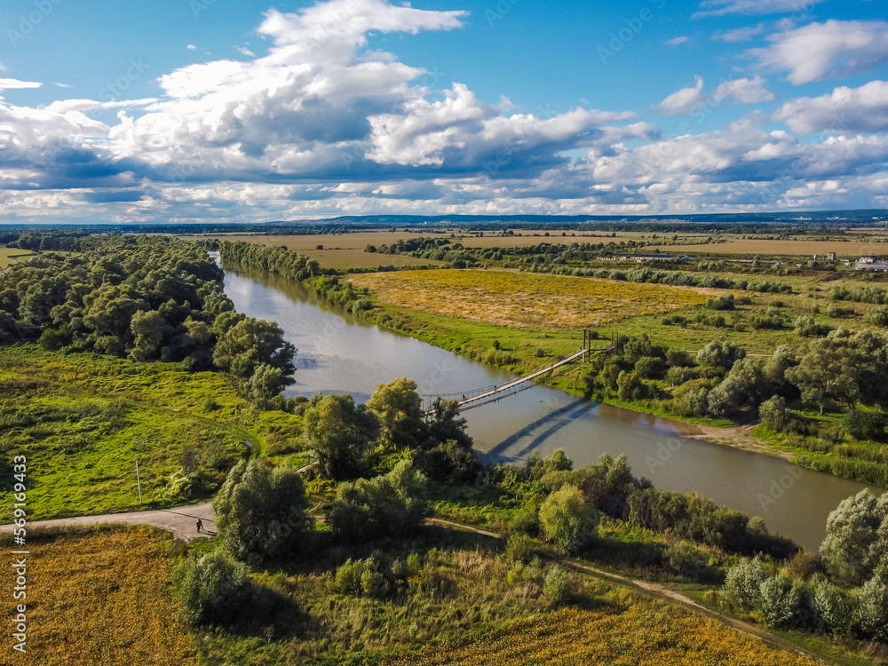 Aerial vIew of Zhudachiv city by drone. Summer Ukraine Lviv region, West Ukraine. River.
