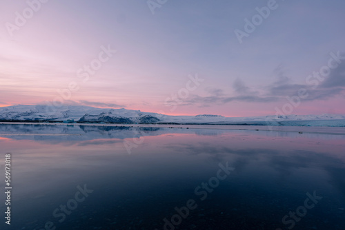 iceberg in the water  Floating Glaciers  beautiful pink sunset