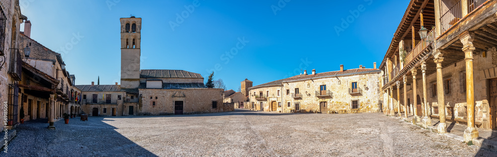 Panoramic view of the main square of the medieval city of Pedraza with its old stone buildings, Segovia, Spain.