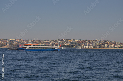 ferryboats on Bosporus strait and Anatolian side of Istanbul city view from Dolmabahce Palace pier © ssmalomuzh