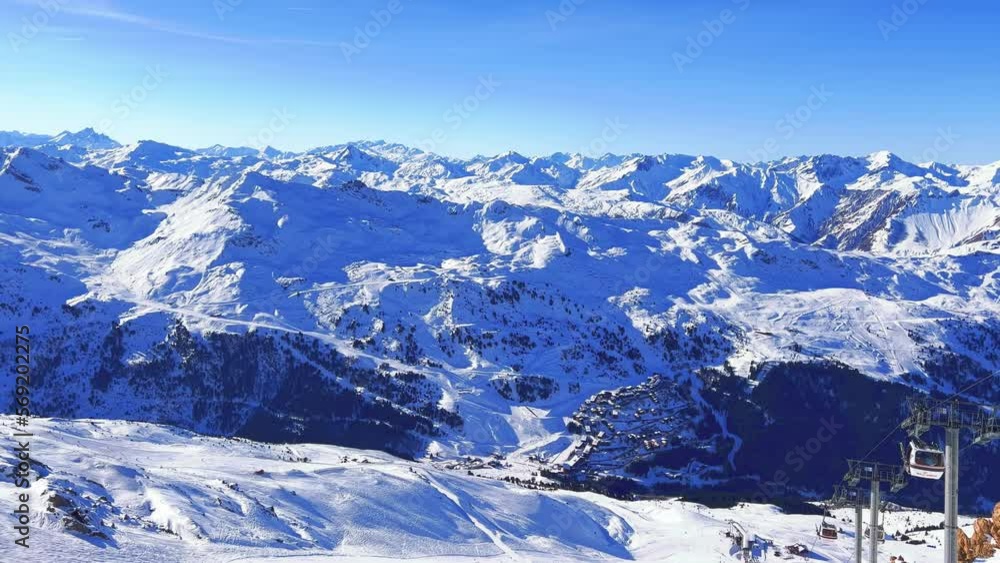 Meribel, France: Panoramic view of French Alps (Savoie Alps), mountains with lot of snow, winter sunny day with clear blue sky in famous ski resort Meribel, France: Panoramic view of French Alps (Savoie Alps), mountains with lot of snow, winter sunny day with clear blue sky in famous ski resort