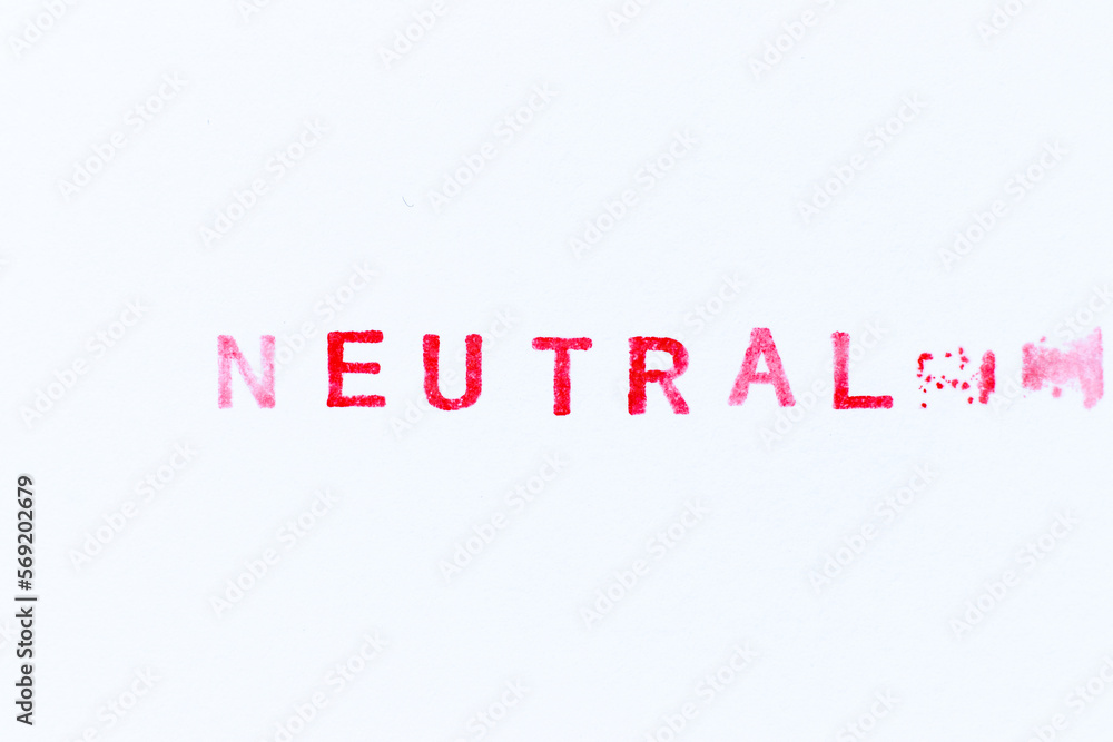 Red color ink rubber stamp in word neutral on white paper background