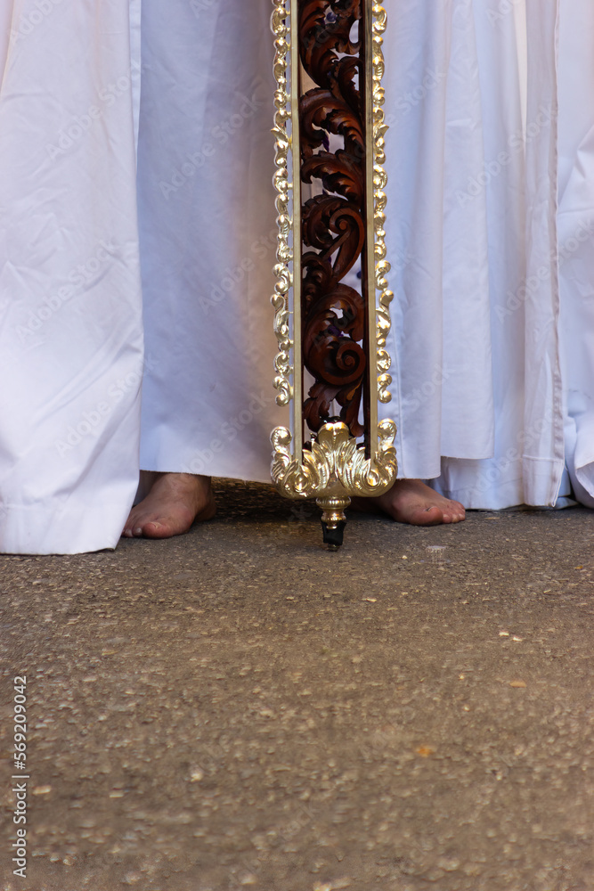 Feet of a Nazarene or penitent during a Holy Week procession.