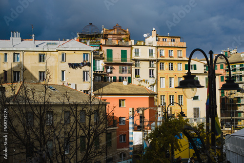 Landscape with colored facades of houses in Europe. Panorama of the city of Genia in Italy. View of the old town. Houses on the hill.