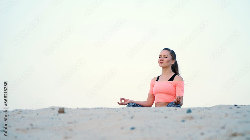 healthy yoga woman meditation at sunrise seaside