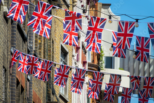 British Union Jack flag street in a street in London, UK national celebration, king coronation or funeral