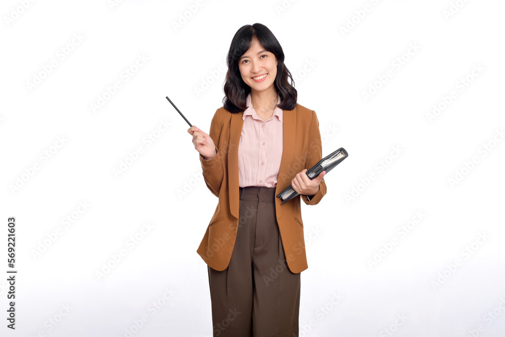 Happy young asian business woman holding notepad and pointing pencil up isolated on white background Happy young asian business woman holding notepad and pointing pencil up isolated on white background