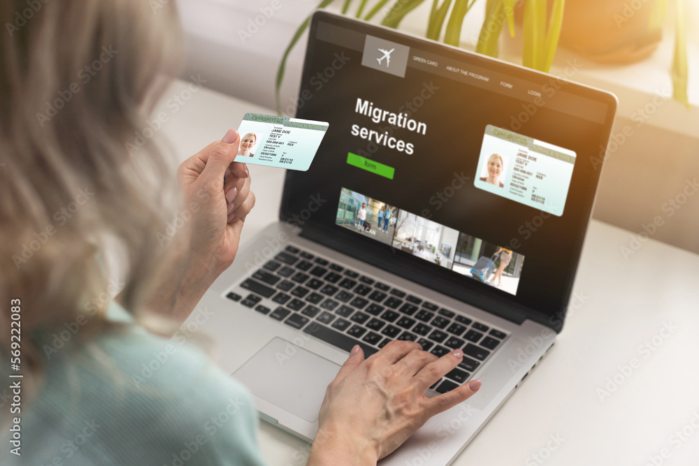 Woman fills out application to Consular Section of Embassy to obtain visa online. Woman fills out application to Consular Section of Embassy to obtain visa online.