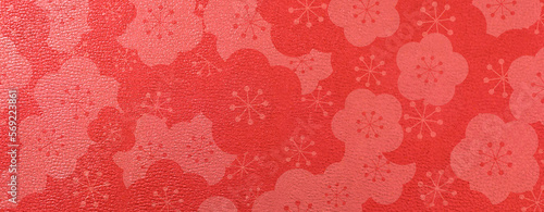 伝統の赤い和紙に梅の花柄模様