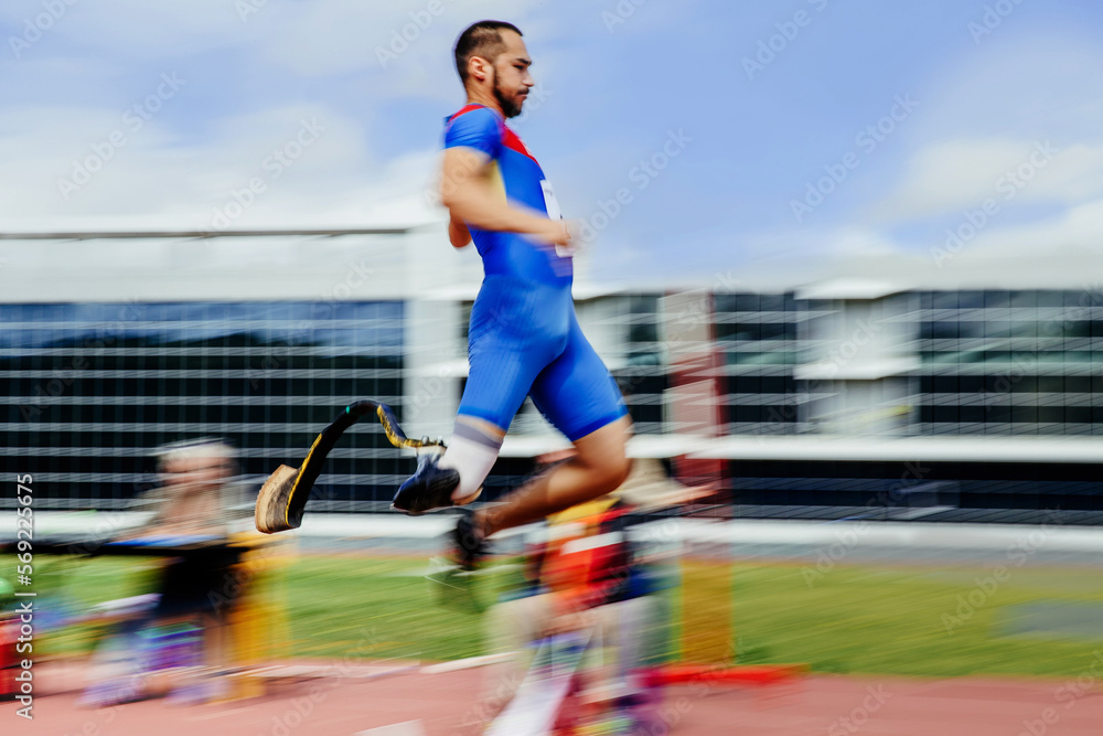 motion blur athlete on prosthesis long jump