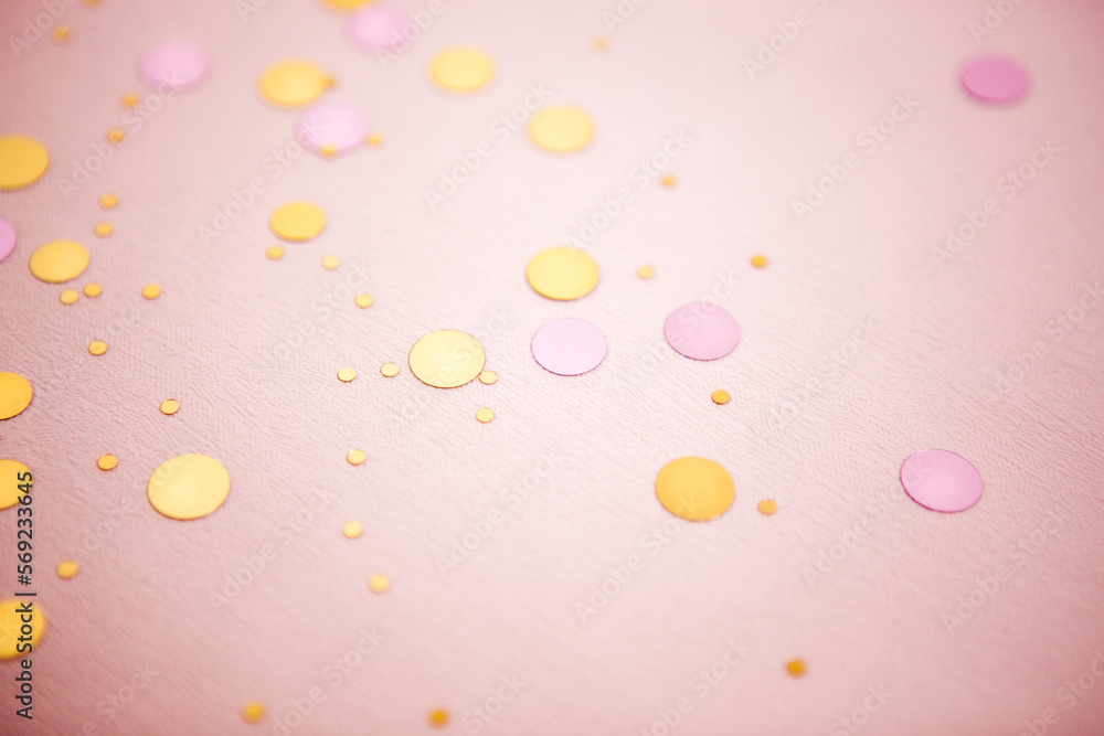 Pink celebration background with glittering gold confetti decoration and bokeh Pink celebration background with glittering gold confetti decoration and bokeh