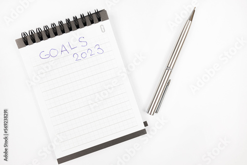 Wallpaper Mural Goals 2023 plan notes with metal pen - Productivity plan - Business and self improvement Torontodigital.ca