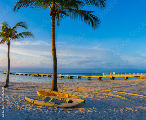 Fototapeta Naklejka Na Ścianę i Meble -  Kayaks On Sand Covered Beach at Higgs Beach Memorial Park, Key West, Florida, USA