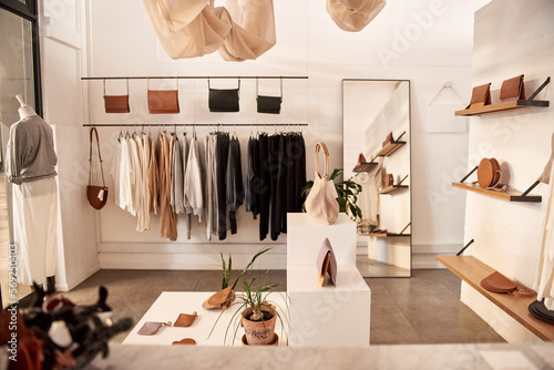 Interior of a stylish clothing and accessories boutique photo