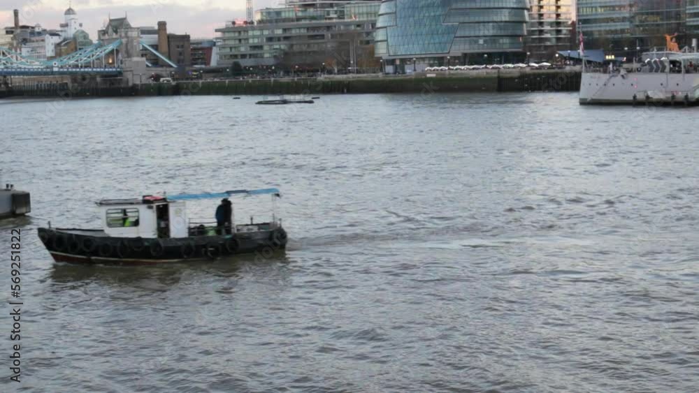 Boat on the river Thames, across from city hall Boat on the river Thames, across from city hall