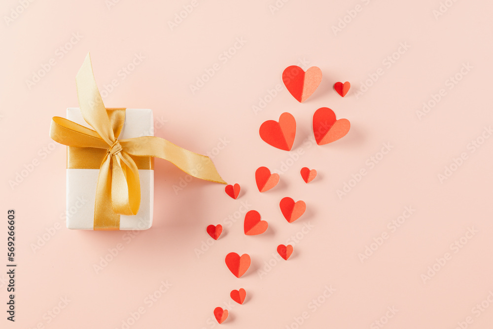Top view flat lay of paper hearts and gift box on pastel pink background surprise your loved with space for text, birthday greeting, web design banner holiday, Happy Valentine Day Background Top view flat lay of paper hearts and gift box on pastel pink background surprise your loved with space for text, birthday greeting, web design banner holiday, Happy Valentine Day Background