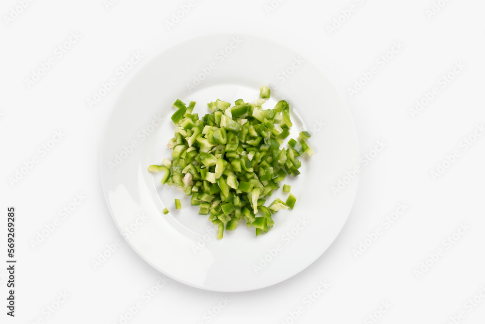Sliced green pepper on a plate. Organic and healthy food. Seasonal vegetables. Sliced green pepper on a plate. Organic and healthy food. Seasonal vegetables.