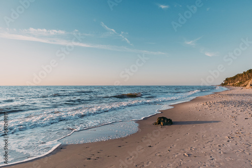 Fototapeta Naklejka Na Ścianę i Meble -  Pusta  dzika plaża, zachód słońca Ustka, Rowy, Poddąbie Bałtyk Polska