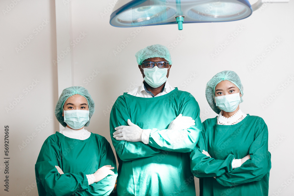 concentrated professional surgeons team during operation process in surgery by stand up through many hour surgeries, tumor cancer. surgical biopsy specimens. healthcare and medical concept. concentrated professional surgeons team during operation process in surgery by stand up through many hour surgeries, tumor cancer. surgical biopsy specimens. healthcare and medical concept.