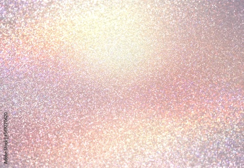 Iridescent shimmer yellow pink textured background.