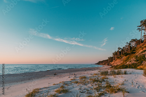 Pusta  dzika plaża, zachód słońca Ustka, Rowy, Poddąbie Bałtyk Polska © Adam
