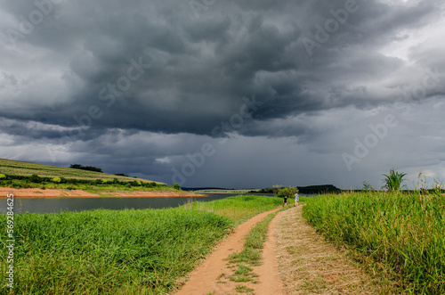landscape with road, storm, cloud day, rain, gray clouds
