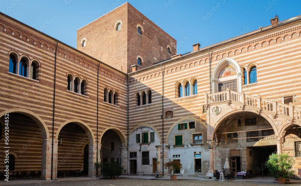 Palace of Reason (Palazzo della Ragione), historic Palace of Verona, located between Piazza delle Erbe and Piazza dei Signori. Verona,Veneto region in northern Italy, September 9, 2021