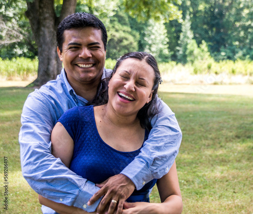 Mexican couple laughing and smiling for the camera