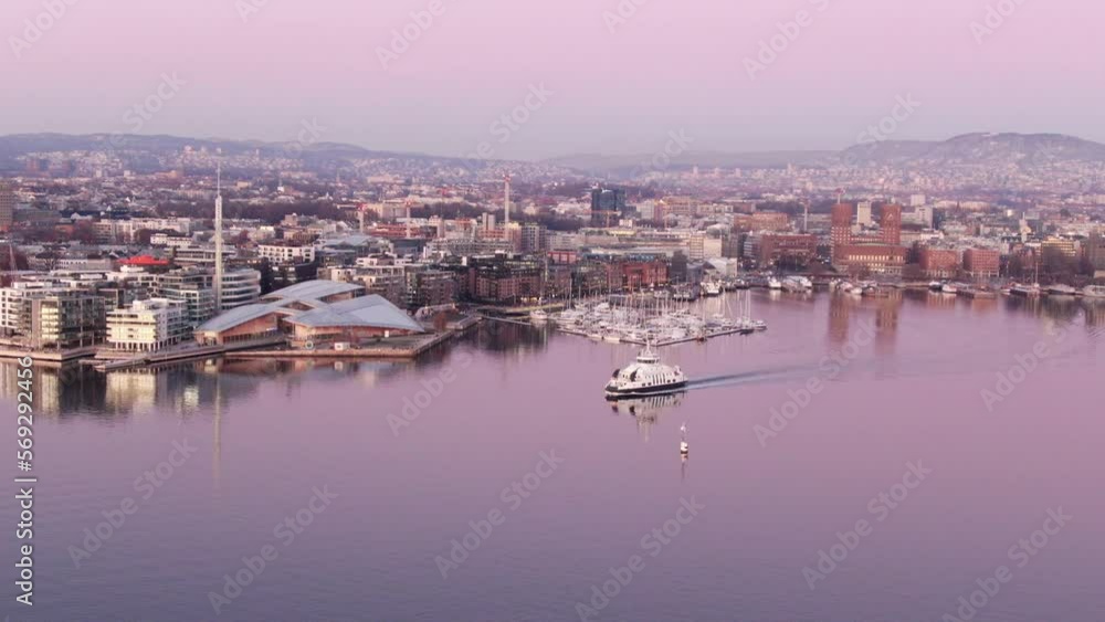 Ferry boat in Oslo fjord, Norway at sunset Ferry boat in Oslo fjord, Norway at sunset