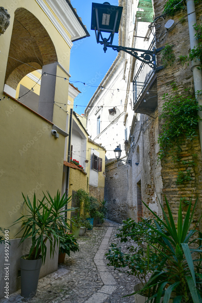 An alley between the old houses of Lucera, an ancient town in Puglia, Italy.